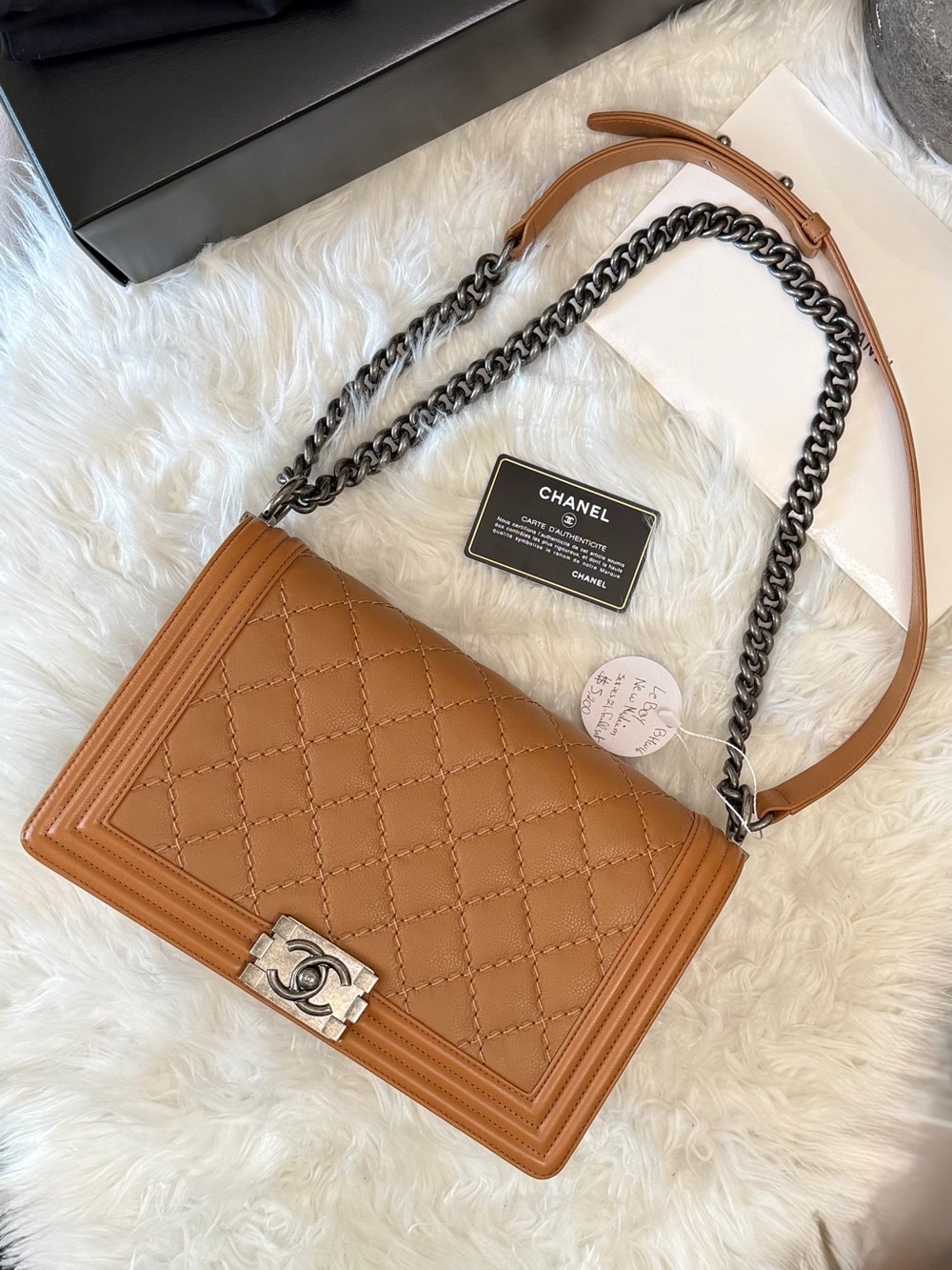 CHANEL BOY FLAP BAG IN CAVIAR LEATHER